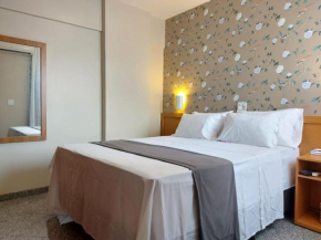 Aconchegante flat ll 1Q ll St Central ll Prox a Praça Cívica ll BX01H